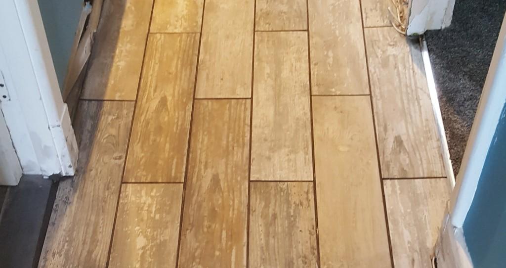 Porcelain wood effect tiles after grouting in Holmes Chapel